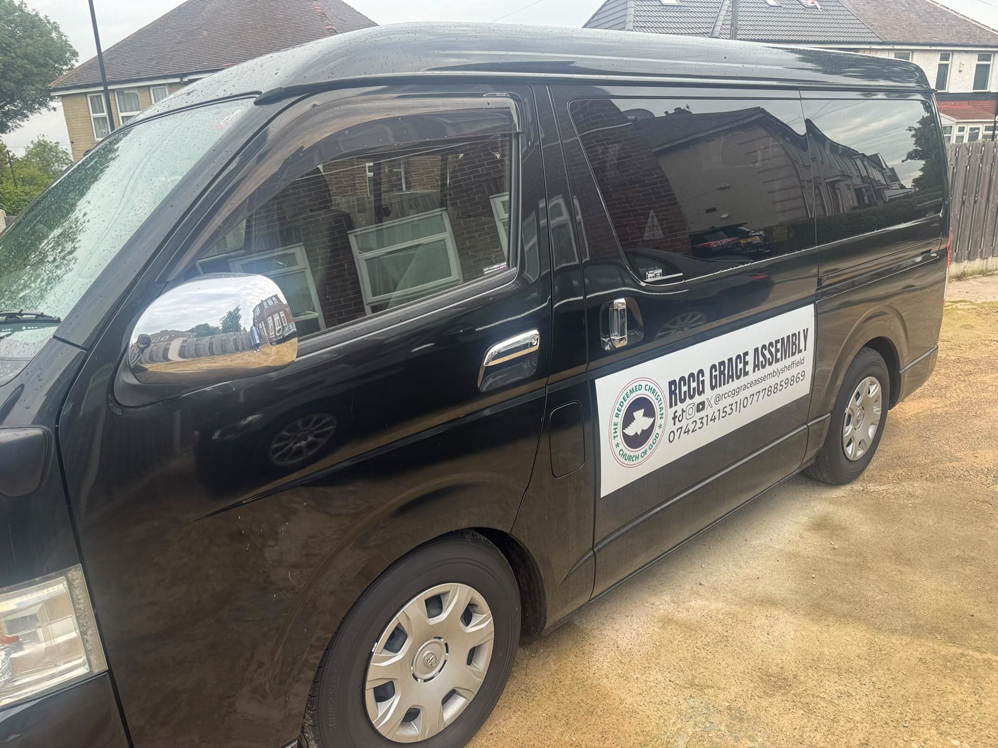 RCCG Grace Assembly transport van with church signage