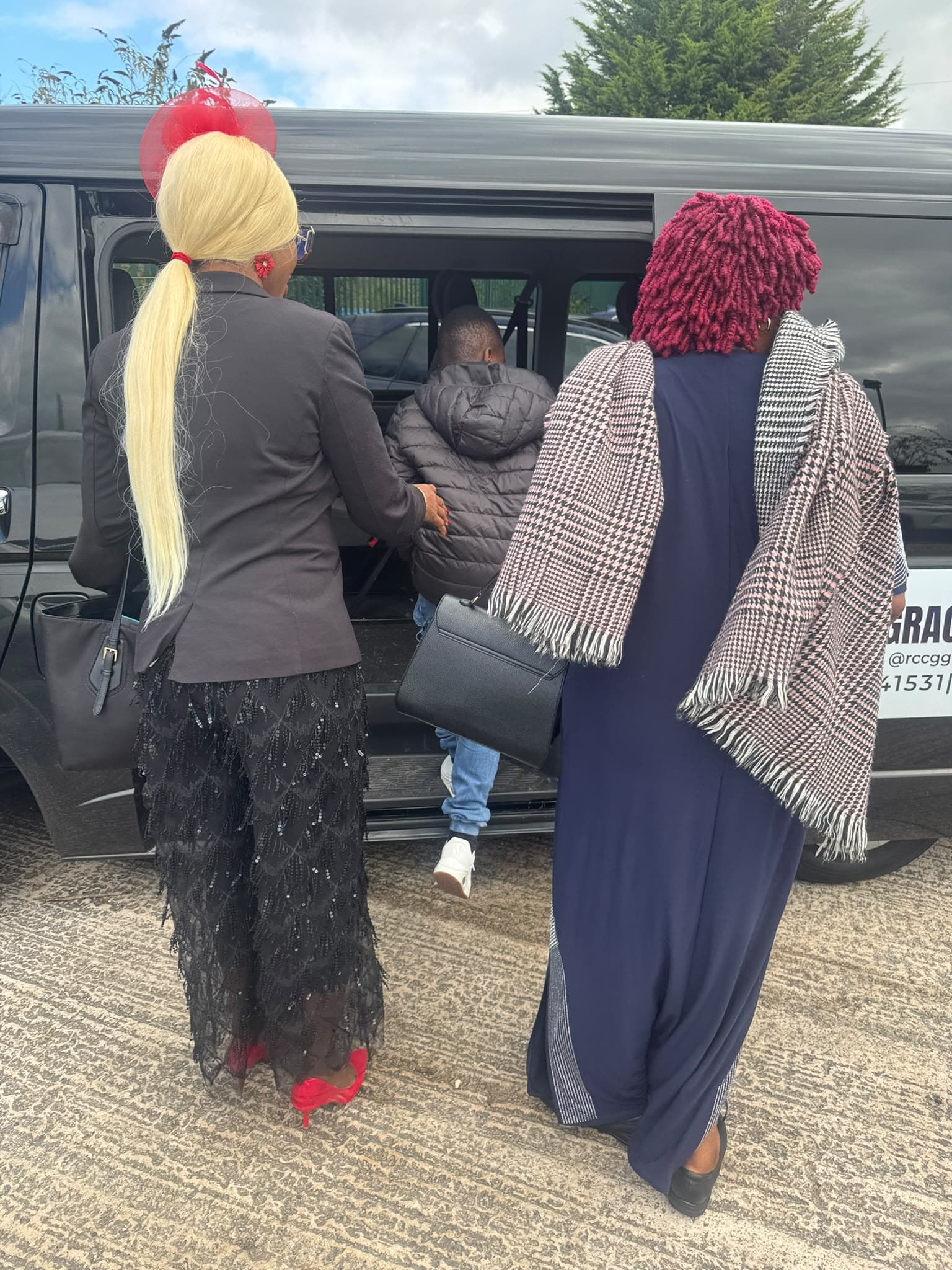 Church members boarding the transport van