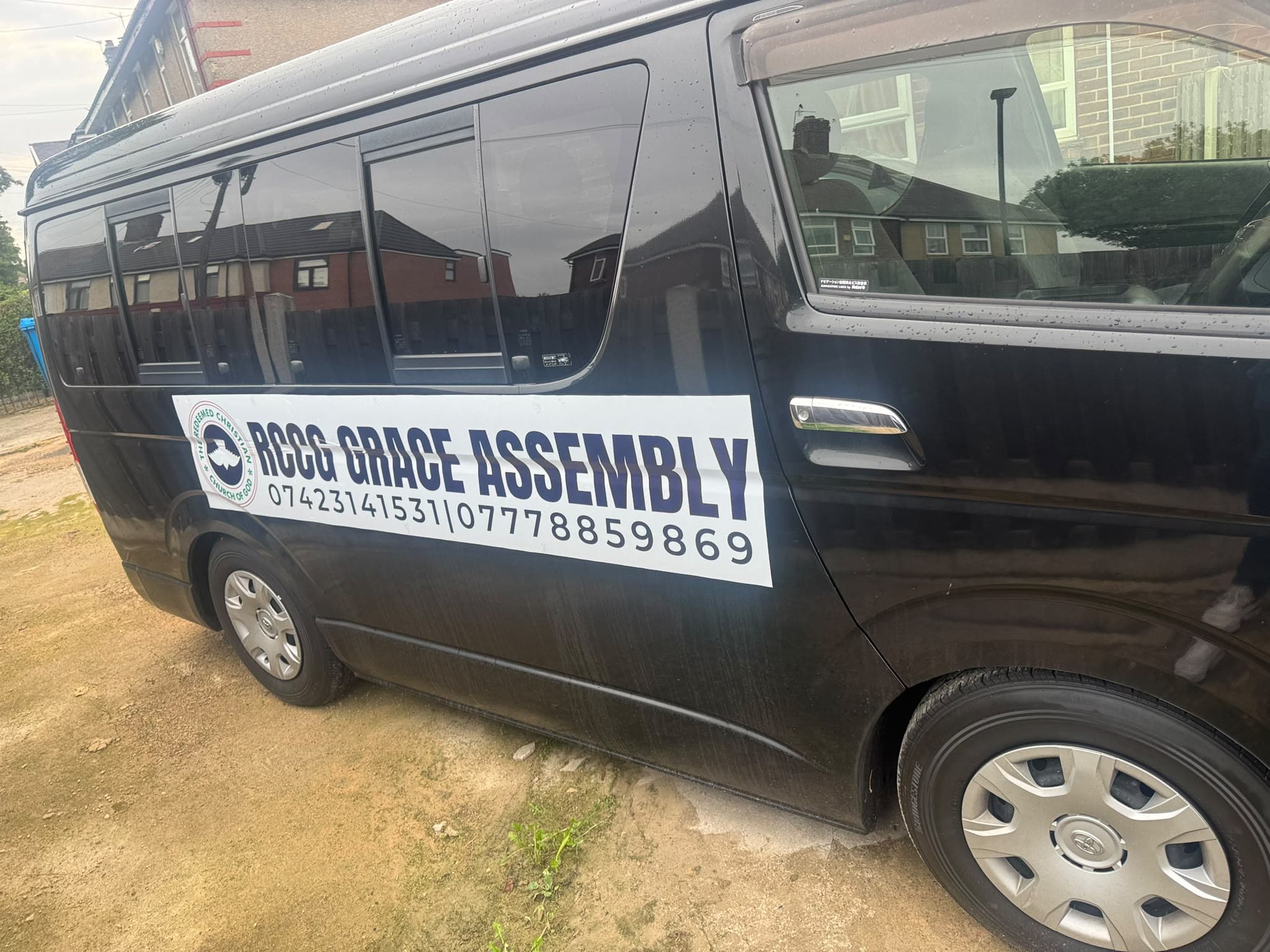 Transport van side view with contact details